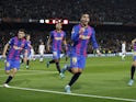 Barcelona's Ferran Torres celebrates scoring their first goal with Pedri, Jordi Alba and Pierre-Emerick Aubameyang on February 17, 2022