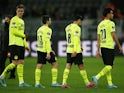 Borussia Dortmund players looks dejected after the match on February 17, 2022