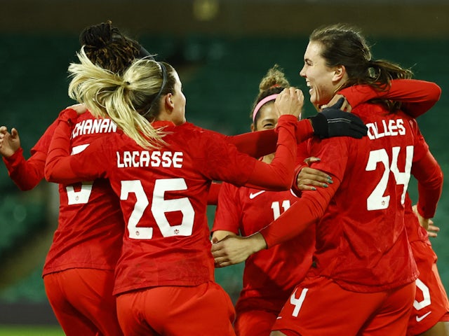 Canada Women's Vanessa Gilles celebrates scoring their first goal with teammates on February 20, 2022