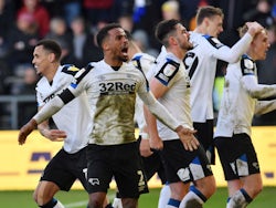 Derby County's Louie Sibley celebrates scoring their first goal with teammates on February 19, 2022