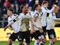 Derby County's Louie Sibley celebrates scoring their first goal with teammates on February 19, 2022
