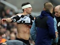  Newcastle United's Fabian Schar prepares to come back on to the pitch after sustaining a head injury on February 13, 2022
