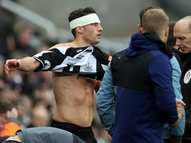  Newcastle United's Fabian Schar prepares to come back on to the pitch after sustaining a head injury on February 13, 2022