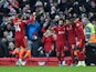 Liverpool's Mohamed Salah celebrates scoring their second goal with teammates on February 19, 2022