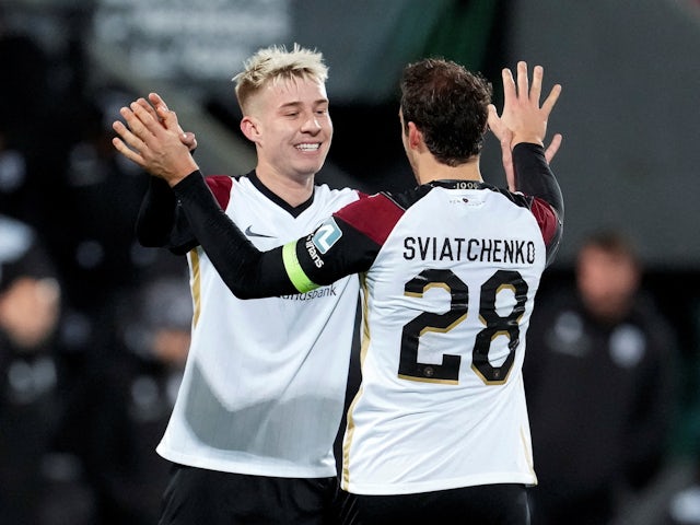 Midtjylland's Charles celebrates with Erik Sviatchenko after the match on February 17, 2022