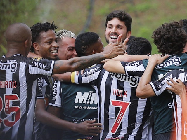 Atletico Mineiro's Ignacio Fernandez celebrates scoring their first goal with teammates on February 20, 2022