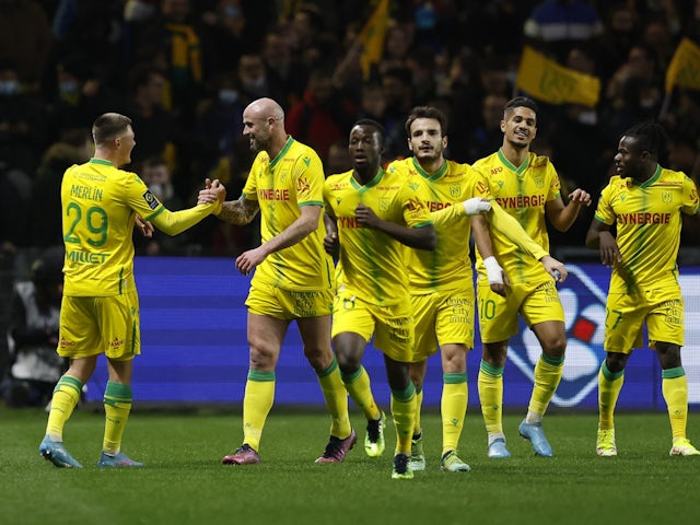 Nantes' Quentin Merlin celebrates scoring their second goal with teammates on February 19, 2022