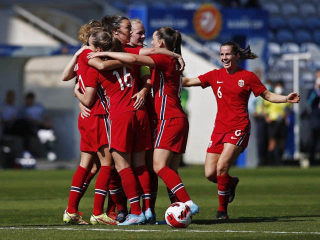 Norway Women's Celin Bizet Ildhusoy celebrates scoring their first goal with Tuva Hansen and teammates on February 20, 2022