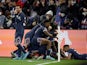 Paris Saint-Germain's (PSG) Kylian Mbappe celebrates scoring their first goal with teammates on February 15, 2022