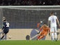 Real Madrid's Thibaut Courtois saves a penalty from Paris Saint-Germain's (PSG) Lionel Messi on February 15, 2022