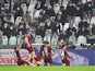 Torino's Andrea Belotti celebrates scoring their first goal with teammates on February 18, 2022
