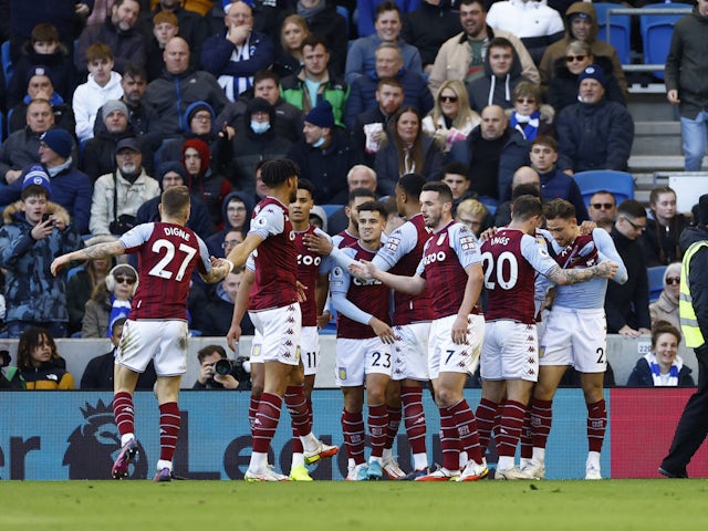 Aston Villa's Matty Cash celebrates scoring their first goal with teammates on February 26, 2022