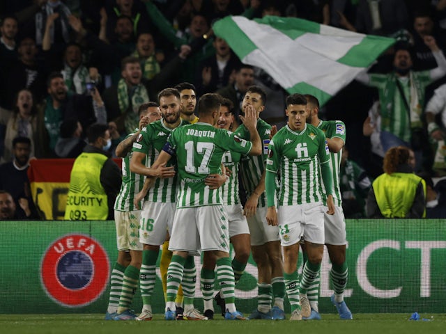 Real Betis players celebrate after the match on February 24, 2022