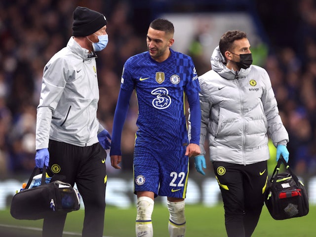 Chelsea's Hakim Ziyech walks off the pitch after receiving medical attention on February 22, 2022