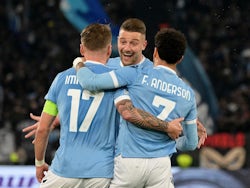 Lazio's Ciro Immobile celebrates scoring their first goal with teammates on February 24, 2022