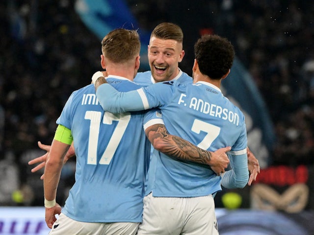 Lazio's Ciro Immobile celebrates with his teammates after scoring his first goal on 24 February 2022
