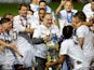 Leeds United players and manager Marcelo Bielsa celebrate winning the Championship and promotion to the Premier League on July 22, 2020