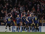 Manchester United's Anthony Elanga celebrates scoring their first goal with teammates on February 23, 2022