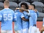 New York City forward Talles Magno (43), center, is congratulated after scoring his second goal of the game in the second half against Santos de Guapiles at Banc of California Stadium on February 24, 2022
