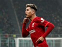 Roberto Firmino celebrates scoring for Liverpool against Inter Milan in February 2022