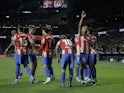 Atletico Madrid's Renan Lodi celebrates scoring their first goal with teammates on February 26, 2022