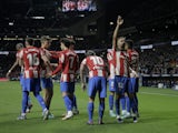 Atletico Madrid's Renan Lodi celebrates scoring their first goal with teammates on February 26, 2022