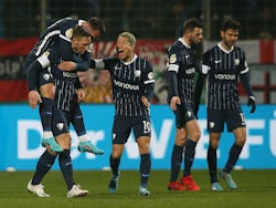 VfL Bochum's Sebastian Polter celebrates scoring their first goal with teammates on March 2, 2022