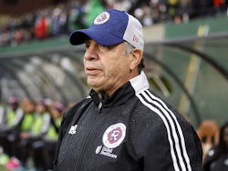 New England Revolution head coach Bruce Arena looks on before a match against the Portland Timbers at Providence Park on February 26, 2022