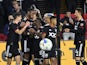 DC United forward Michael Estrada (7) celebrates with teammates after scoring a goal against the Charlotte FC in the first half at Audi Field on February 26, 2022