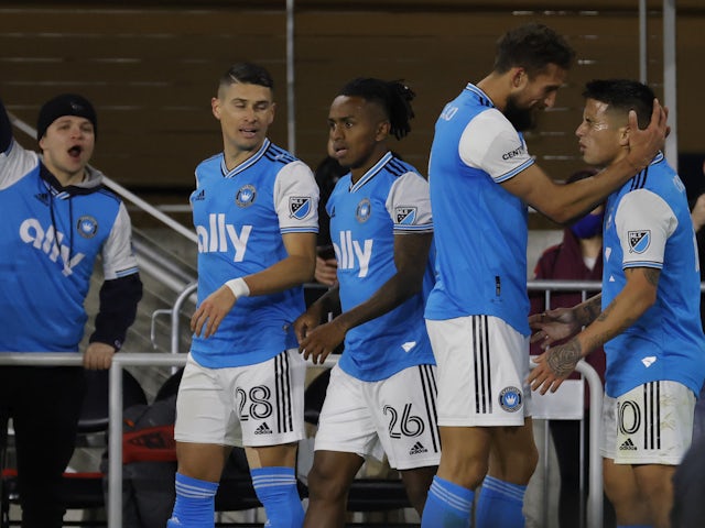 Charlotte FC forward Christian Ortiz (10) celebrates with Charlotte FC defender Guzm?n Corujo (4) after scoring an apparent goal against the D.C. United in the first half at Audi Field. The goal was reversed on VAR on February 26, 2022