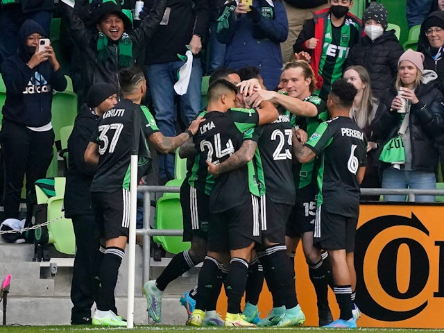 Austin FC celebrate after midfielder Alexander Ring (8) scored a goal against FC Cincinnati during the first half at Q2 Stadium on February 26, 2022