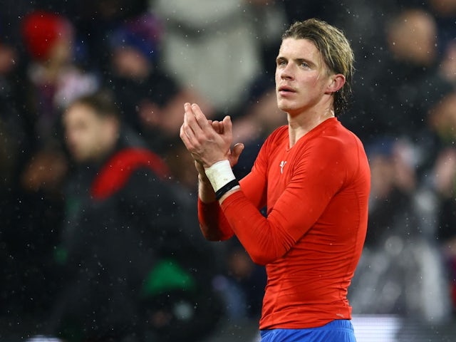 Crystal Palace's Conor Gallagher applauds fans after the match on March 1, 2022