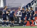 New England Revolution midfielder Carles Gil (10) celebrates his goal against the FC Dallas with midfielder Sebastian Lletget (17), midfielder Brandon Bye (15) and defender Andrew Farrell (2) during the first half at Gillette Stadium on March 5, 2022