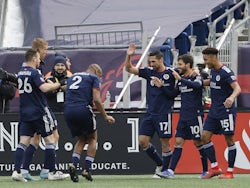 New England Revolution midfielder Carles Gil (10) celebrates his goal against the FC Dallas with midfielder Sebastian Lletget (17), midfielder Brandon Bye (15) and defender Andrew Farrell (2) during the first half at Gillette Stadium on March 5, 2022