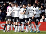 Derby County's Ravel Morrison celebrates scoring their first goal with teammates on March 5, 2022