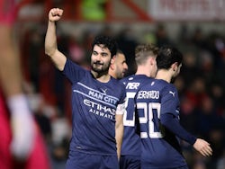 Manchester City's Ilkay Gundogan celebrates scoring their third goal on January 7, 2022