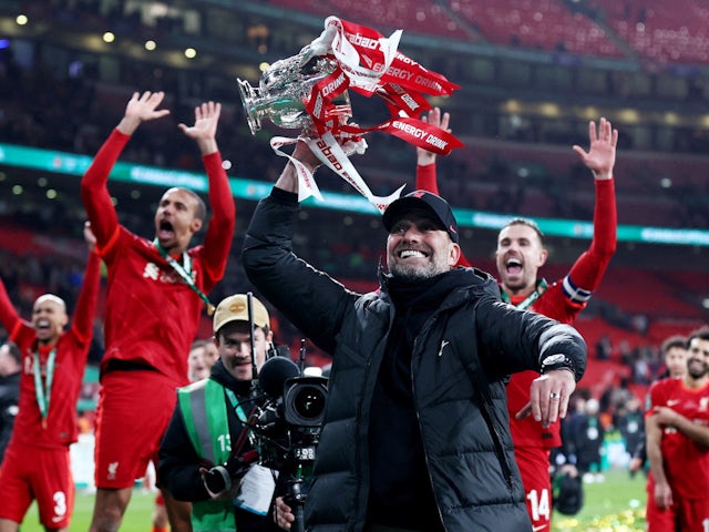 Liverpool manager Jurgen Klopp celebrates with the trophy after winning the Carabao Cup on February 27, 2022