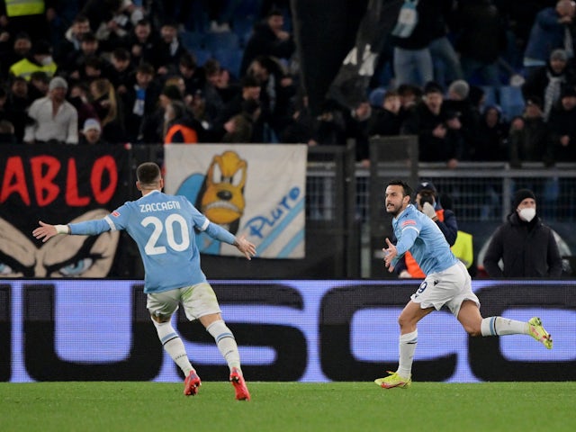 Lazio's Pedro celebrates scoring their first goal with Mattia Zaccagni on February 27, 2022
