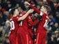 Liverpool's Takumi Minamino celebrates scoring their second goal with teammates on March 2, 2022