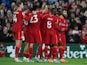 Liverpool's Sadio Mane celebrates scoring their first goal with Mohamed Salah and teammates on March 5, 2022