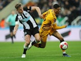 Cambridge United's Harvey Knibbs is fouled by Newcastle United's Matt Ritchie on January 8, 2022