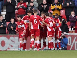 Middlesbrough's Paddy McNair celebrates scoring their first goal with teammates on March 5, 2022