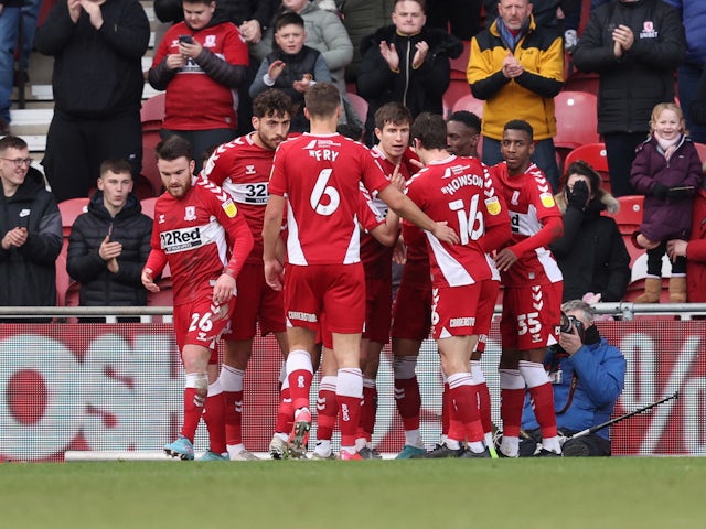 Middlesbrough's Paddy McNair celebrates scoring their first goal with teammates on March 5, 2022