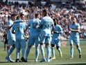 Teammates celebrate with Minnesota United midfielder Robin Lod (17) after he scored a goal in the first half against the Philadelphia Union at Subaru Park on February 26, 2022