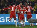 Monaco players celebrate after Guillermo Maripan scores their first goal on March 2, 2022