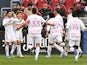 New York Red Bulls midfielder Lewis Morgan (10, left) is greeted by team mates after scoring his second goal against Toronto FC in the first half at BMO Field on March 5, 2022