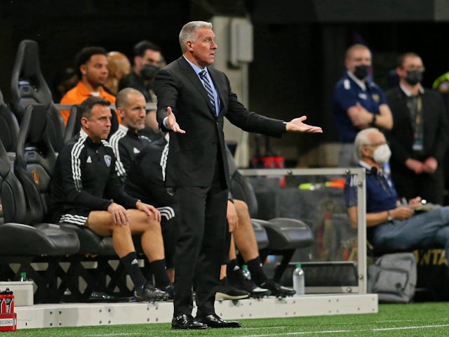 Sporting Kansas City head coach Peter Vermes reacts after a play against Atlanta United during the first half at Mercedes-Benz Stadium on February 27, 2022