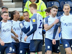 Preston North End's Cameron Archer celebrate scoring their first goal with teammates on March 5, 2022