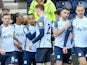 Preston North End's Cameron Archer celebrate scoring their first goal with teammates on March 5, 2022