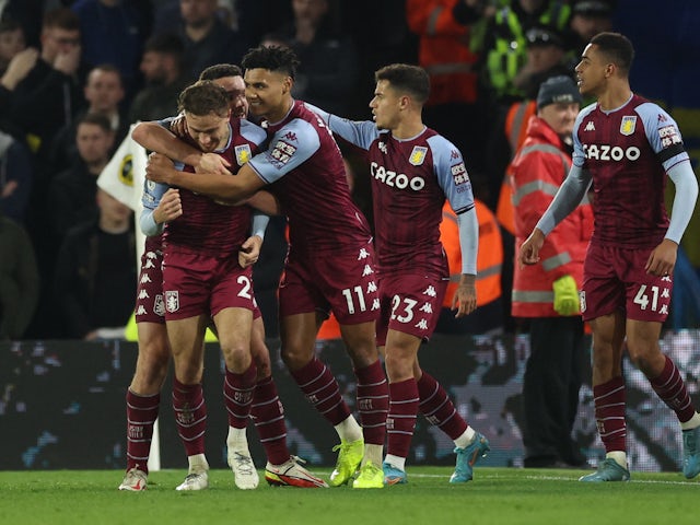 Aston Villa's Matty Cash celebrates scoring their second goal with teammates on March 10, 2022